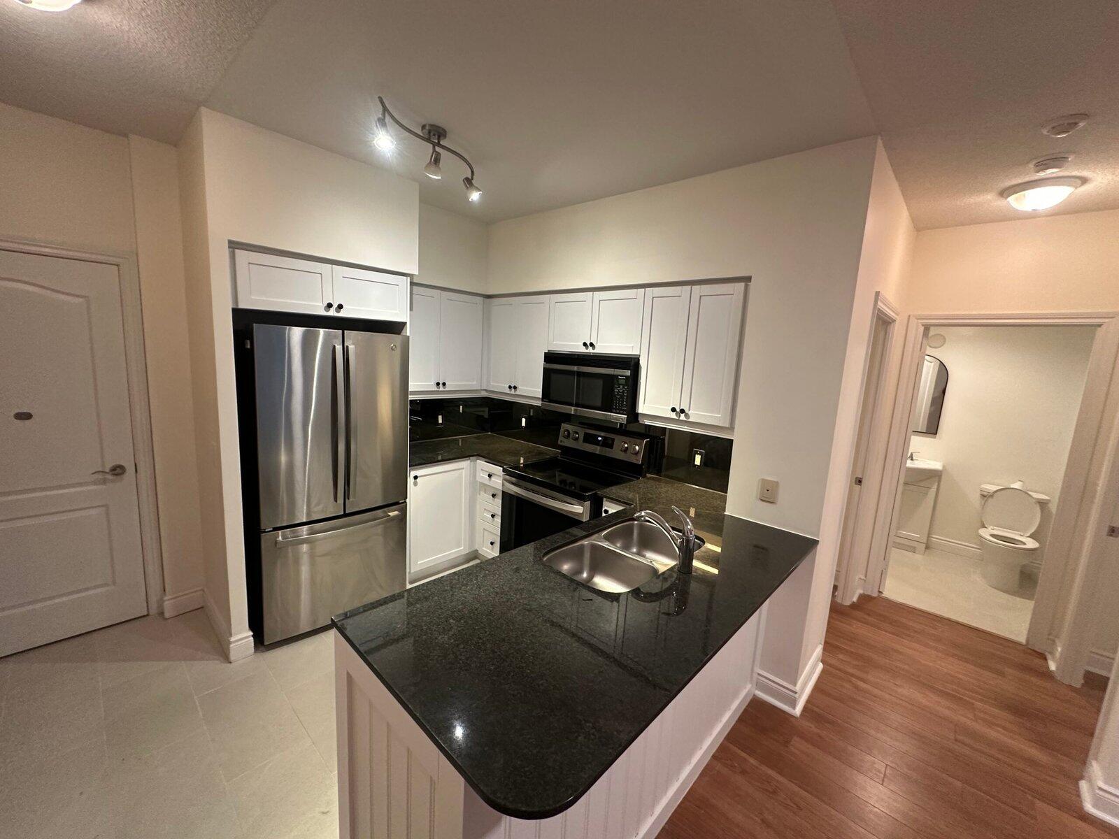 Refinished kitchen with painted cabinets